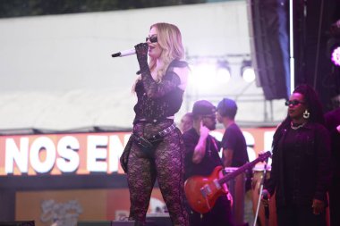 Sao Paulo (SP), 01 / 25 / 2024 - Şarkıcı Luisa Sonza, bu Perşembe Sao Paulo 'daki Latin Amerika Anıtı' nda Anitta provasını gerçekleştiren şarkıcı Anitta ile bir katılım gösterdi. 