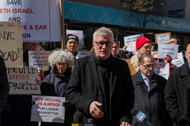 Elected Officials Representing Lower Manhattan Rally As Mount Sinai Beth Israel Planned Closure Nears. March 24, 2024, New York, New York, USA: New York State Senator Brian Kavanagh speaks at a rally calling to keep Mount Sinai Beth Israel  clipart