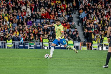 MADRID (ES) 03 / 26 / 2024 - Oyuncu Lucas Paqueta, İspanya ile Brezilya arasında oynanan ve Madrid 'deki Santiago Bernabeu Stadyumu' nda düzenlenen milli takımların dostları için geçerli olan maçta