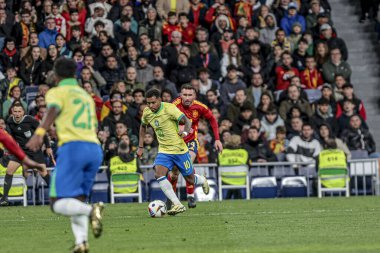 MADRID (ES) 03 / 26 / 2024 - Oyuncu Lucas Paqueta, İspanya ile Brezilya arasında oynanan ve Madrid 'deki Santiago Bernabeu Stadyumu' nda düzenlenen milli takımların dostları için geçerli olan maçta