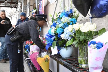 New York 'ta bir polis memuru vurularak öldürüldü. 27 Mart 2024, Far Rockaway, Queens, New York, ABD. NYPD Memuru Jonathan Diller, 31 yaşında, Queens, NYC 'de bir trafik çevirmesinde öldürüldü.