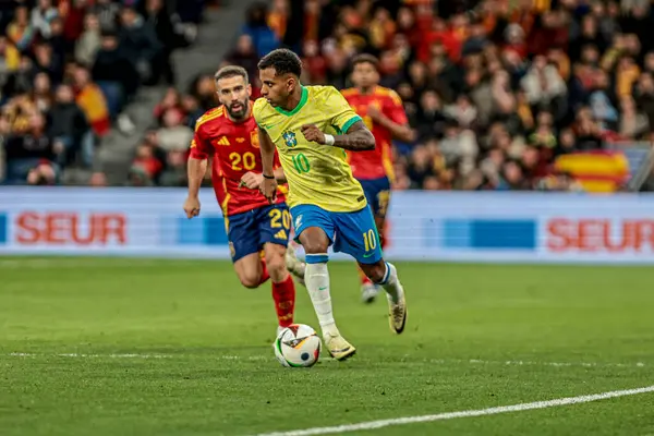 MADRID (ES) 03 / 26 / 2024 - Oyuncu Lucas Paqueta, İspanya ile Brezilya arasında oynanan ve Madrid 'deki Santiago Bernabeu Stadyumu' nda düzenlenen milli takımların dostları için geçerli olan maçta
