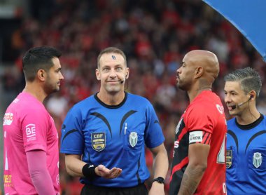 CURITIBA (PR), Brazil 06/04/2024 - Referee Lucas Paulo Tozerim, during the match between Athletico PR against Maringa, valid for the final of the Campeonato Paranaense 2024, in Ligga Arena  clipart