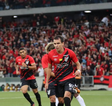 CURITIBA (PR), Brazil 06/04/2024 - The player Pablo Teixeira celebrates his goal, during a match between Athletico PR against Maringa, valid for the final of the Campeonato Paranaense 2024 clipart