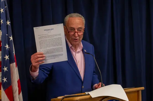 stock image Senator Schumer Issues Warning For Consumers Over Capital One Merger With Discover. April 07, 2024, New York, New York, USA: Senate Majority Leader, U.S. Senator Chuck Schumer (D-NY) is voicing concern that Capital One's planned acquisition 