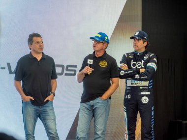 SAO PAULO, (SP) - 04/19/2024 - Drivers Guilherme Spinelli, Ingo Hoffman and Caca Bueno during Mitsubishi's return to Stock Car Brasil. The Japanese automaker announces its return to competition  clipart