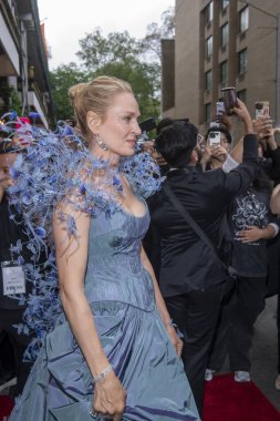 The Pierre Hotel: 2024 Met Gala Departures. May 06, 2024, New York, New York, USA: Uma Thurman wearing Tory Burch departs the Pierre Hotel for 2024 Met Gala on May 06, 2024 in New York City. clipart
