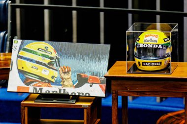 Brasilia, Brazil  05/10/2024  Ayrton Senna's helmet is displayed during a solemn session held at the Federal Senate, in Brasilia, to honor the Formula 1 driver, this Friday (10).  clipart