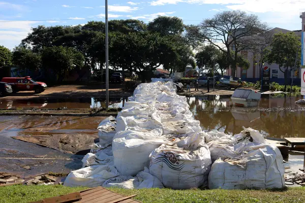 stock image Porto Alegre (RS), 05/17/2024 After the reconnection of some Stormwater Pumping Stations (EBAP), several streets in the Centro Historico and Praia de Belas neighborhoods were cleared of water