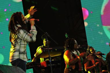 Sao Paulo (SP), Brazil - 05/18/2024 - CULTURE/SHOWS /VIRADA CULTURAL - Julian Marley's reggae took over Vale do Anhangabau on Saturday night during Virada Cultural 2024. clipart