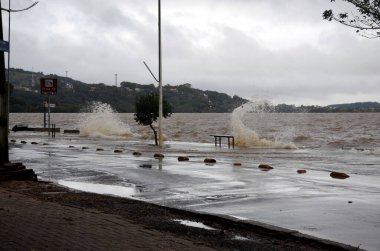 Porto Alegre (RS), Brazil 05/24/2024 Rain causes disruption again and floods neighborhoods, this Friday (24). Places such as the Ipanema and Guaruja neighborhoods, in the South Zone of the capital, were flooded again clipart