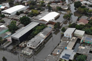 Kanolar (RS), Brezilya 05 / 28 / 2024 Mathias Velho mahallesinin bir kısmının havadan görüntüsü, Kanoas kenti hala sular altında ve sokaklar güvenlik nedeniyle kapatılmış durumda
