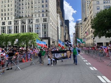 New York 'ta 2024 Porto Riko Ulusal Yürüyüşü. 9 Haziran 2024, New York, ABD: 2024 Porto Riko Ulusal Yürüyüşü sırasında Pro Filistin Protestosu saat 11: 00 'de başladı ve New York' taki 44 ile 79. Cadde arasında 5. Cadde 'de saat 17: 00' ye kadar devam etti. 