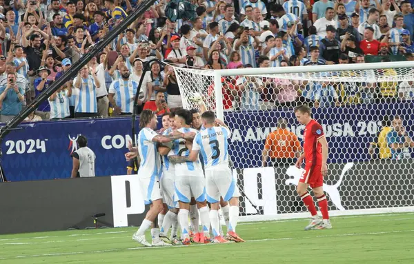 stock image Copa America Semi Final : Argentina vs Canada. July 9, 2024, East Rutherford, New Jersey, USA: Messi of Argentina scored second goal and celebrates with teammates during soccer match between Argentina and Canada valid for the Semifinal 