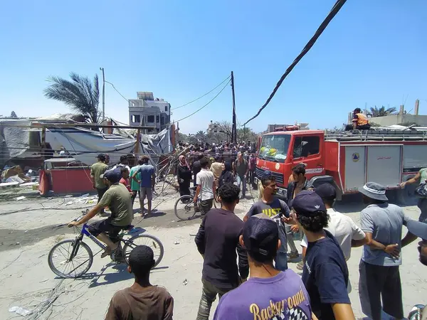 stock image July 13, 2024, Khan Yunis, Gaza, Palestine: A tragedy in Mawasi Khan Yunis today (13) with some Palestinians wounded as they were targeted by the Israeli Army. 