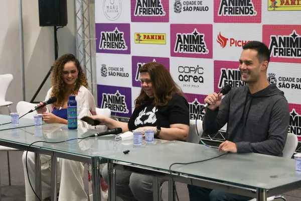 stock image Sao Paulo (SP), 07/18/2024 - Special Naruto Dubbing Collective with Tati Keplmair (Sakura Haruno), Ursula Bezerra (Naruto) and Robson Kumode (Sasuke Uchiha) at the biggest event in Asian anime and pop culture from Latin America. 