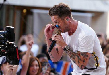 OneRepublic Performs Live on the Today Show July 19, 2024, New York, USA: Ryan Tedder of OneRepublic delivered an outstanding performance on the Today Show at Rockefeller Center this morning.  clipart