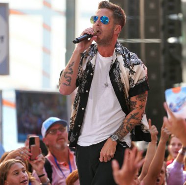 OneRepublic Performs Live on the Today Show July 19, 2024, New York, USA: Ryan Tedder of OneRepublic delivered an outstanding performance on the Today Show at Rockefeller Center this morning.  clipart