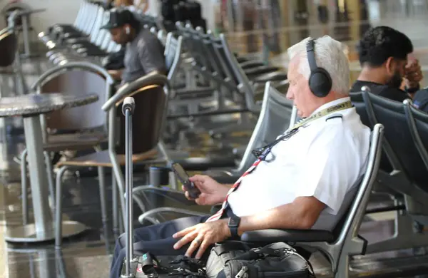 stock image Cyber Blackout at Major Airports-Ronaldo Reagan Washington National AirPort. July 19, 2024, Arlington, Virginia, USA: A cyber blackout is causing flight delays, impacting banking and communications services globally on Friday (19).