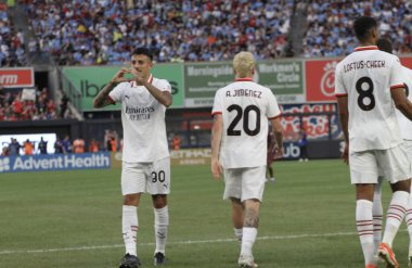 Manchester City ve Milan Friendly. 27 Temmuz 2024, New York, ABD: AC Milan 'dan Nasti Marco, İngiltere' nin Manchester City ile İtalya 'nın AC Milan takımları arasında oynanması beklenen uluslararası futbol karşılaşmasında takım arkadaşlarıyla golünü kutluyor 