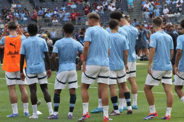 Manchester City ve Milan Friendly. 27 Temmuz 2024, New York, ABD: Manchester City Oyuncuları, 27 Temmuz Cumartesi günü Yankee Stadyumu 'nda İngiltere' nin Manchester City ile İtalya 'nın AC Milan takımları arasında oynanması beklenen uluslararası futbol karşılaşması öncesinde ısındı 