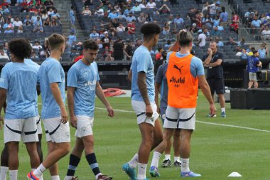 Manchester City ve Milan Friendly. 27 Temmuz 2024, New York, ABD: Manchester City Oyuncuları, 27 Temmuz Cumartesi günü Yankee Stadyumu 'nda İngiltere' nin Manchester City ile İtalya 'nın AC Milan takımları arasında oynanması beklenen uluslararası futbol karşılaşması öncesinde ısındı 