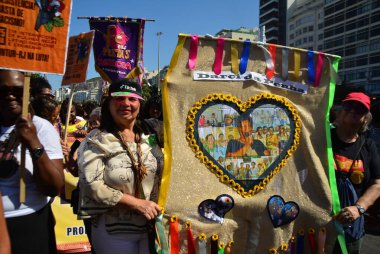 RIO de JANEIRO (RJ), 07 / 28 / 2024 - MARCHA / BLACK KADINLAREN / RJ - Rio de Janeiro 'daki 10 Mart Pazar günü, Rio de Janeiro' daki Copacabana plajında, 28 Temmuz 2024 Pazar günü gerçekleşti..