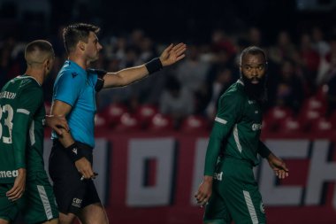 Sao Paulo (SP), Brazil 07/30/2024  Referee Jonathan Benkenstein Pinheiro sends off player Marcao do Goias in the match between Sao Paulo and Goias, from the first leg of the round of 16 of the final  clipart