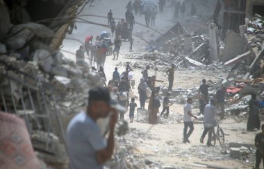 İsrail ordusunun Doğu Bani Sila-Khan Yunus 'tan çekilmesi. 30 Temmuz 2024, Han Yunus, Gazze, Filistin: İsrail ordusunun çekilmesinden sonra bile Doğu Bani Sila 'daki Filistinlilerin tahliyesinin sürmesi 