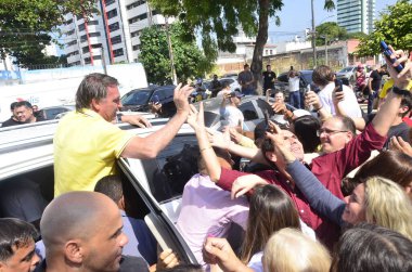 NATAL (RN), Brezilya 08 / 15 / 2024 - Eski başkan Jair Messias Bolsonaro, siyasi gündemini tamamlamak üzere Natal şehrine geldi. Eski başkan güne 96 FM 'de bir röportajla başladı ve etkinliklere katıldı. 