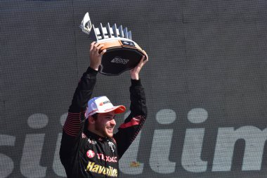 BELO HORIZONTE (MG), Brazil 08/18/2024 - Driver Felipe Batista wins the first race at the Toninho da Matta circuit, in Stock Car, followed by Nelsinho Piquet, and Caca Bueno clipart