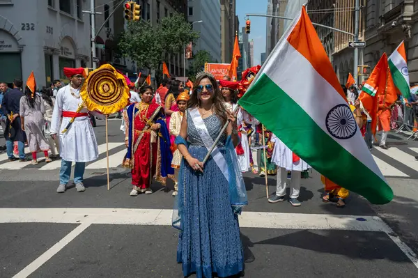 stock image 42nd Annual India Day Parade 2024. August 18, 2024, New York, New York, USA: Participants holding flags march at the 42nd India Day Parade on Madison Avenue on August 18, 2024 in New York City.  