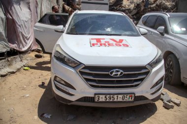 Turkish TRT Arab TV Car targeted by Israeli Army in Gaza. August 20, 2024, Gaza, Palestine: Israel army targeted a Turkish TRT Arab TV Car even bearing all press insignia indicating its a press car.  clipart