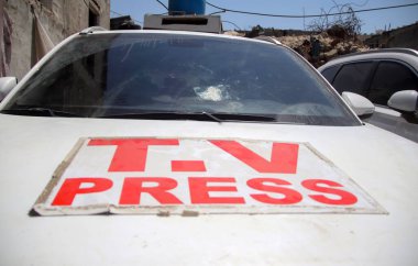 Turkish TRT Arab TV Car targeted by Israeli Army in Gaza. August 20, 2024, Gaza, Palestine: Israel army targeted a Turkish TRT Arab TV Car even bearing all press insignia indicating its a press car.  clipart