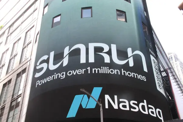 stock image August 20, 2024, New York, USA:  Sunrun rings the opening bell at Nasdaq in Times Square for reaching and powering over 1 million homes with the presence of their CEO, Mary Powell and customers around the USA