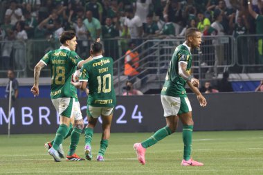 Sao Paulo (SP), Brazil 08/21/2024 - Palmeiras player Rony scores and celebrates his goal in a match between Palmeiras and Botafogo, valid for the second leg of the round of 16 of the Copa Conmebol Libertadores clipart