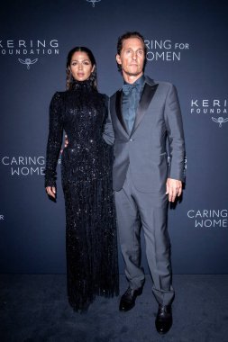 (NEW) 2024 Kering's Caring for Women Dinner. September 09, 2024 - New York, USA: Camila Alves and Matthew McConaughey attending the Kering Foundation's 3rd Annual Caring for Women Dinner at The Pool on September 09, 2024 in New York City clipart