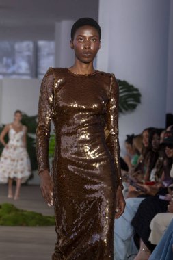 NEW YORK, NEW YORK - SEPTEMBER 10: A model walks the runway at the PatBo show during September 2024 New York Fashion Week on September 10, 2024 in New York City.  clipart