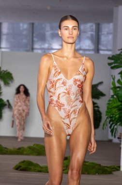 NEW YORK, NEW YORK - SEPTEMBER 10: A model walks the runway at the PatBo show during September 2024 New York Fashion Week on September 10, 2024 in New York City.  clipart