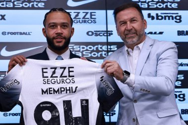 Sao Paulo (SP), Brazil 09/12/2024 - Player Memphis Depay together with Augusto Melo, President of Sport Club Corinthians Paulista, is introduced and gives a press conference to present Corinthians clipart