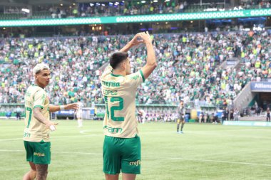 Sao Paulo (SP), Brezilya 09 / 15 / 2024 - Palmeiras 'tan Lopez, Brezilya Futbol Şampiyonası' nın 26. turunda geçerli olan Palmeiras ve Criciuma arasındaki maçtaki golünü kutluyor