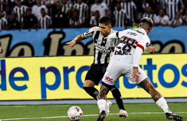 Rio de Janeiro (RJ), 09 / 18 / 2024 - SOCCER / LIBERTADORES / BOTAFOGO / SAO PAULO - Botafogo ve Sao Paulo arasındaki maçta Alan Franco Sao Paulo ile top anlaşmazlığı, Copa Libertadores da America 'nın çeyrek finallerinin ilk ayağı için geçerli
