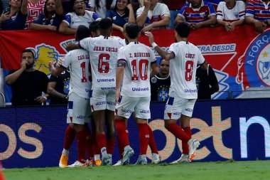 Fortaleza (CE), Brazil 09/21/2024 - Player Everaldo celebrates Bahia's first goal during the match between Fortaleza and Bahia, valid for the 27th round of the 2024 Brazilian Championship Serie A clipart