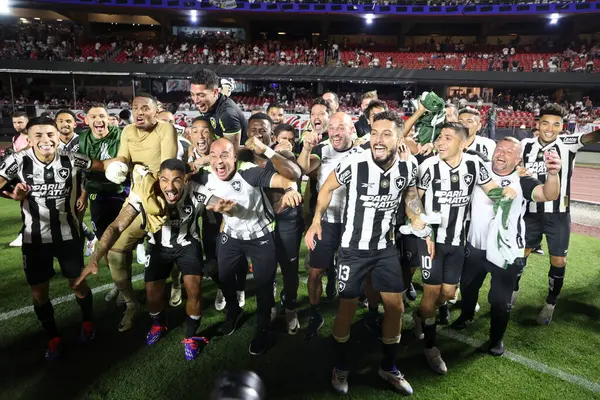 stock image SAO PAULO (SP), Brazil 09/25/2024 - Players John and Thiago Almada celebrate qualifying on penalties in a match between Sao Paulo and Botafogo, valid for the second leg of the quarterfinals of the Copa Libertadores da America (Leco Viana/Thenews2)