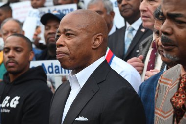 (NEW) Mayor of New York City Eric Adams speaks at a rally supporting him amidst federal criminal charges with clergy, advocates and community leaders on the steps of City Hall. October 1, 2024, Manhattan, New York, USA clipart