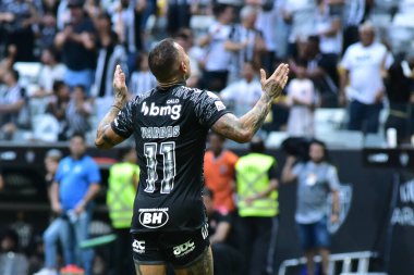 BELO HORIZONTE (MG), 10/05/2024-BRAZILIAN CHAMPIONSHIP/ ATLETICO-MG/VITORIA-BA  Atletico player Eduardo Vargas celebrates his goal, during the match between Atletico and Vitoria, valid for the Brazilian Championship  (paulo ti/thenews2) clipart