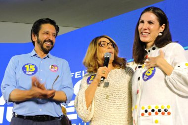 Sao Paulo (SP), Brazil 10/07/2024 - Mayor and candidate for re-election Ricardo Nunes (MDB) held his first campaign event in the 2nd round, receiving support from women and receiving support from candidate Marina Helen (leandro chemalle / thenews2) clipart