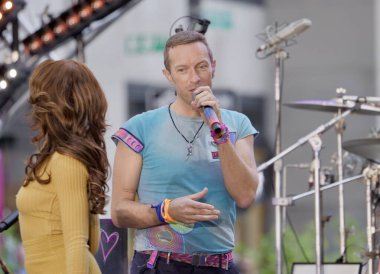 October 8, 2024, New York, USA: Coldplay is performing live on the TODAY Plaza as part of the Citi Concert Series and promoting their new album. Ayra Starr singing 