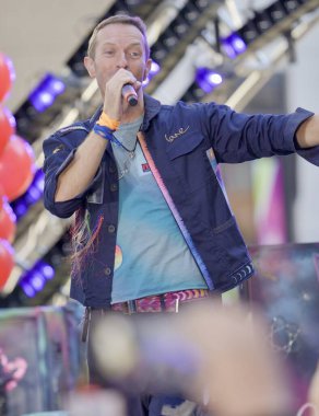 Coldplay Performs live at Today Show in New York. October 8, 2024, New York, USA: Coldplay is performing live on the TODAY Plaza as part of the Citi Concert Series and promoting their new album (niyi_fote_thenews2) clipart