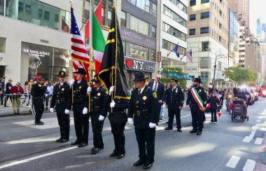 October 14, 2024, New York, USA: The 80thAnnual Columbus Day Parade from West 44thStreet & 5th Avenue with dances, costumes displays and floats showing Italian culture as people line up the avenue (julia mineeva / thenews2) clipart